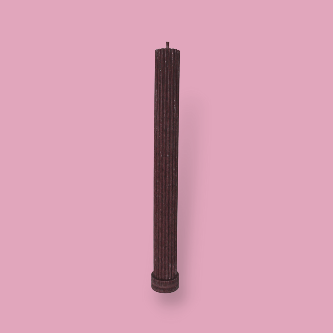 Allegra fluted pillar candle in 27cm height and flat base shown in Viola (deep wine) colour.