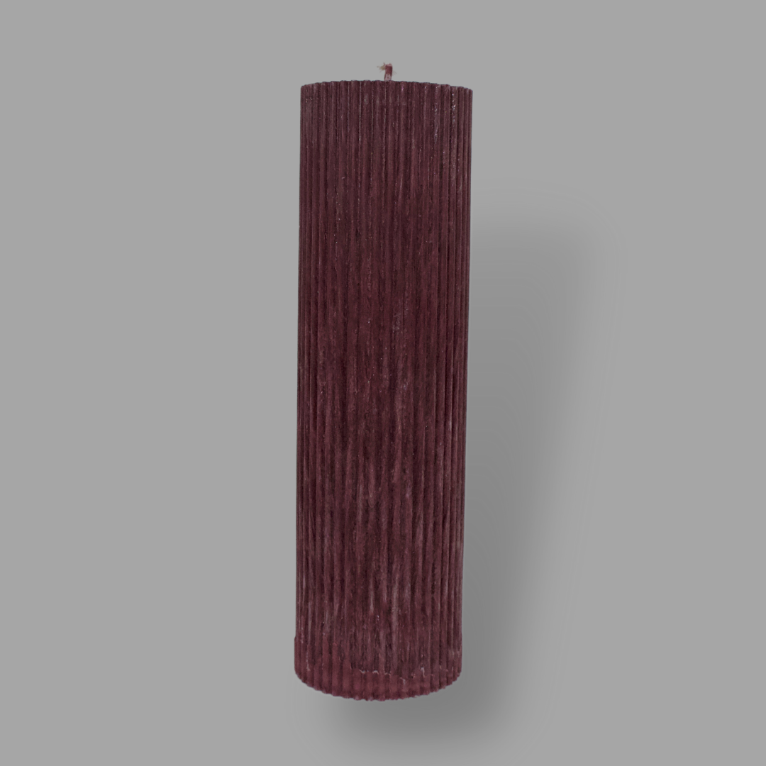 Tall thick fluted pillar candle Kaitlyn in Viola (wine) colour. This standalone pillar candle has a flat top and base.