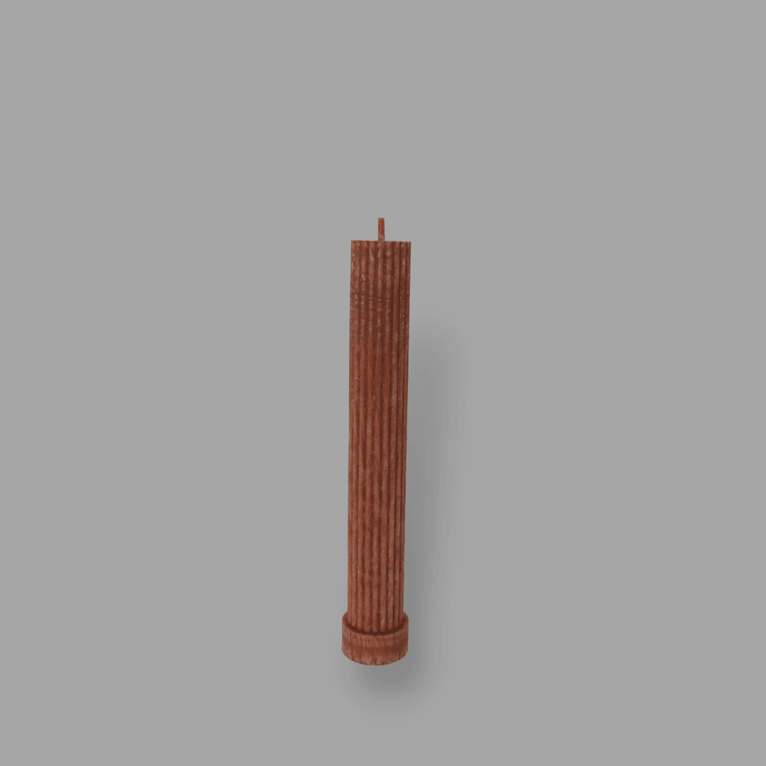 Allegra fluted pillar candle in 20cm height and flat base shown in Rust (burnt orange) colour.