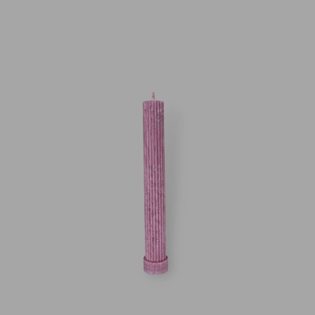 Allegra fluted pillar candle in 20cm height and flat base shown in Calla (pastel cherry) colour.