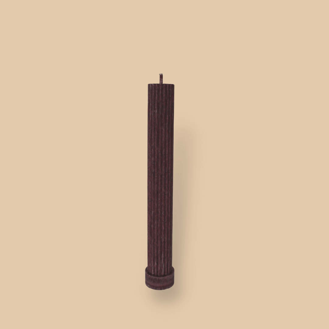 Allegra fluted pillar candle in 22cm height and flat base shown in Viola (deep wine) colour.