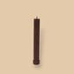 Allegra fluted pillar candle in 22cm height and flat base shown in Cacao (chocolate brown) colour.
