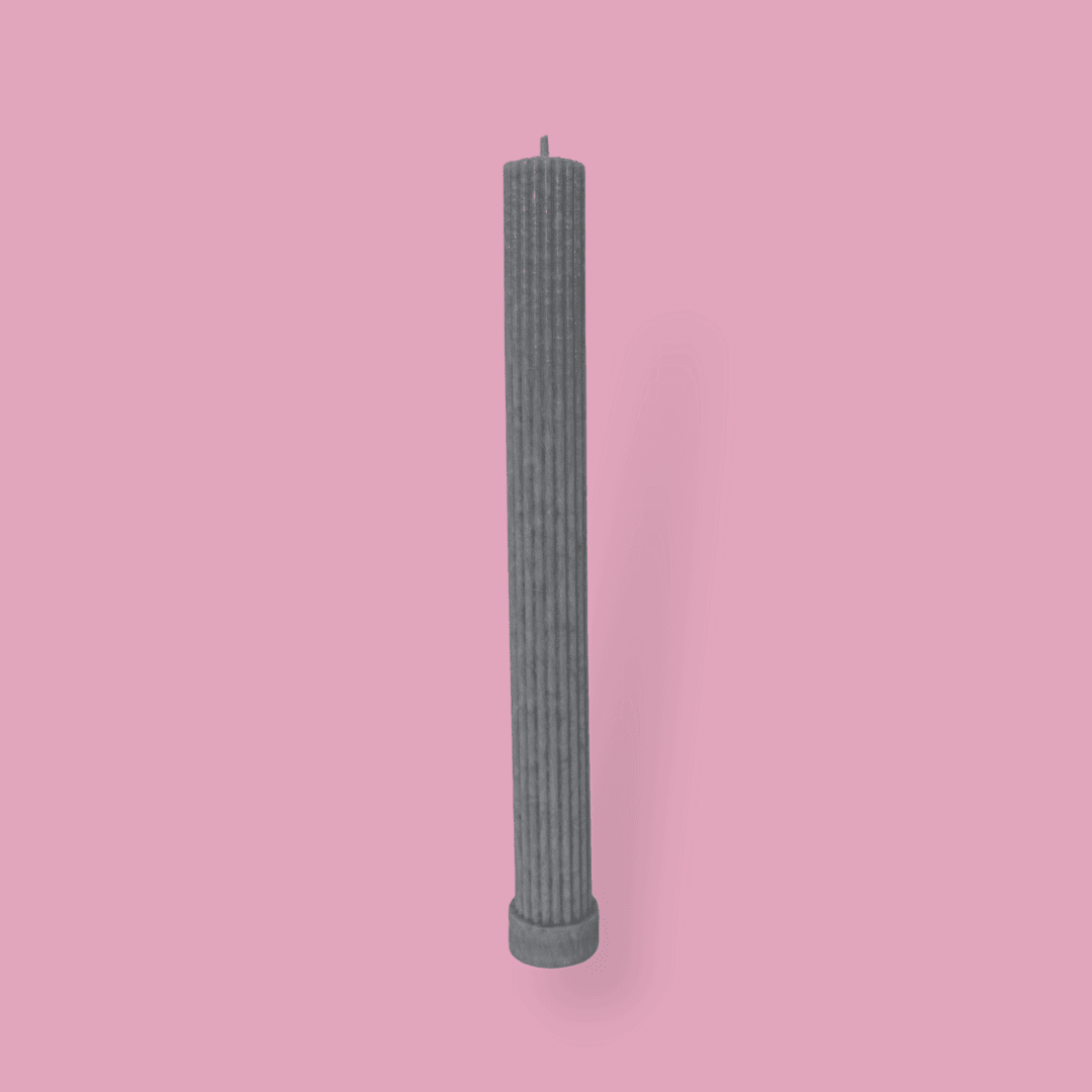 Allegra fluted pillar candle in 27cm height and flat base shown in Half Moon (light grey) colour.