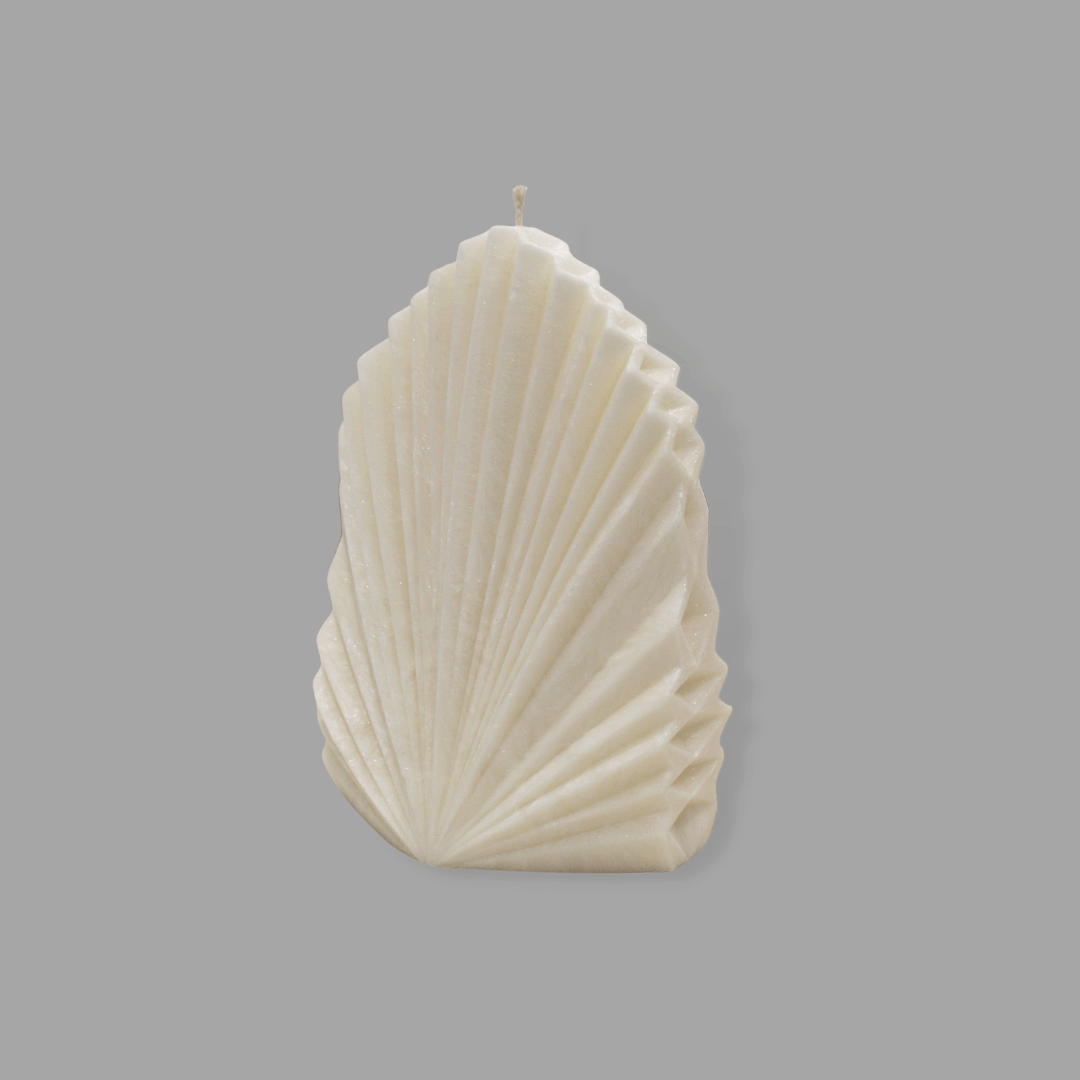 Palm leaf shaped candle Aria in Ivory (white) colour.