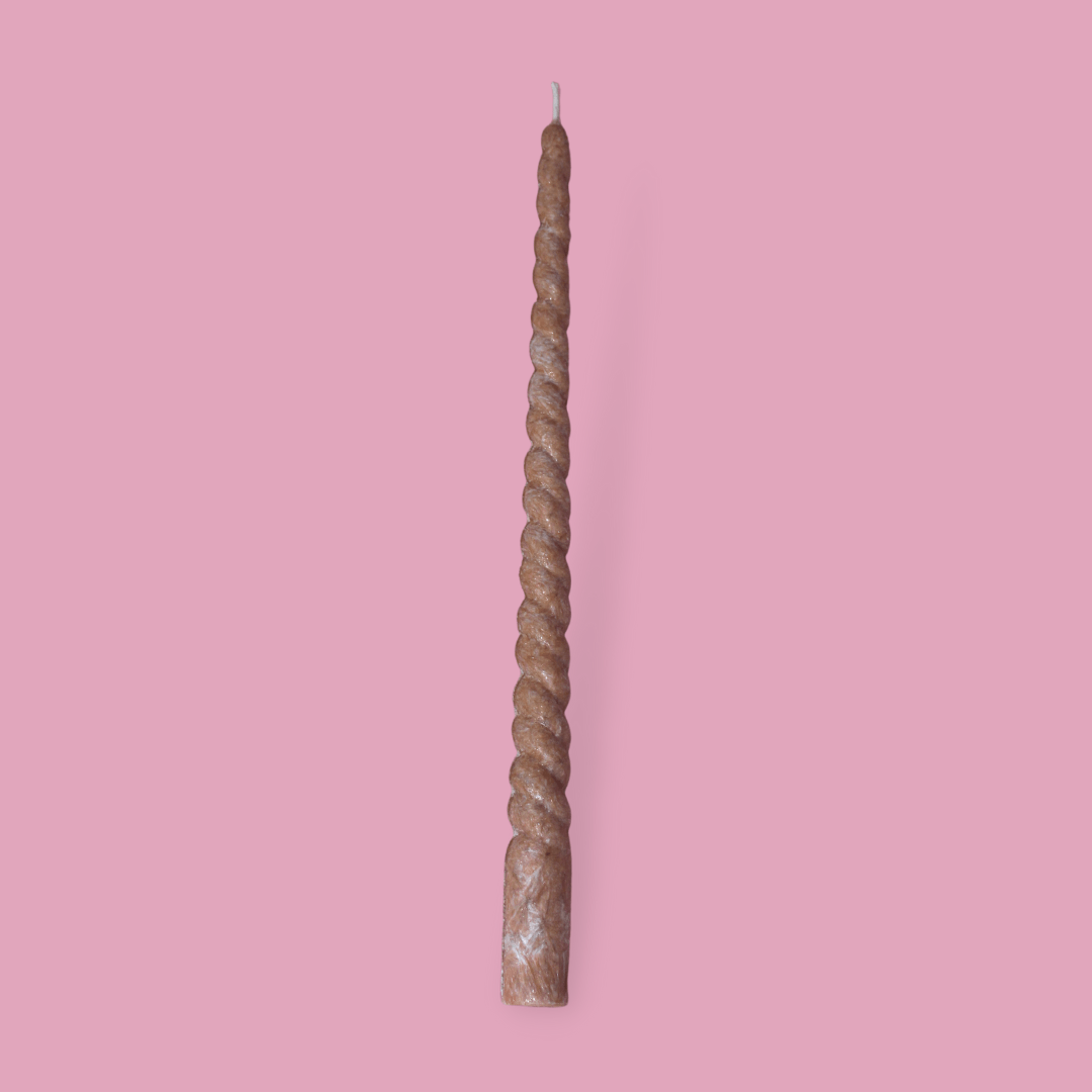 Twisty Ariel taper candle in Rust (burnt orange) colour.