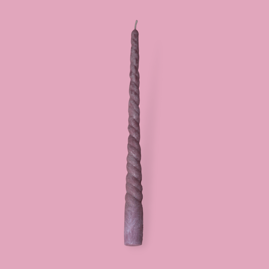 Twisty Ariel taper candle in Calla (pastel cherry) colour.