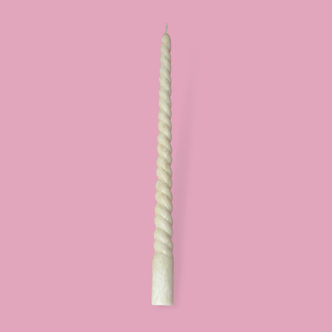 Twisty Ariel taper candle in White Onyx (warm cream) colour.