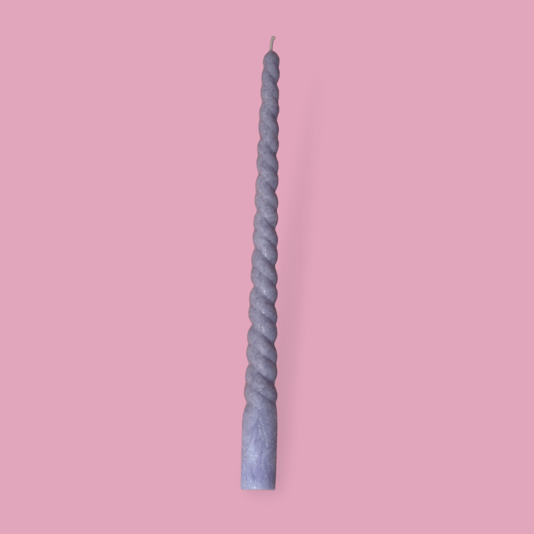 Twisty Ariel taper candle in Lavender (pastel purple) colour.