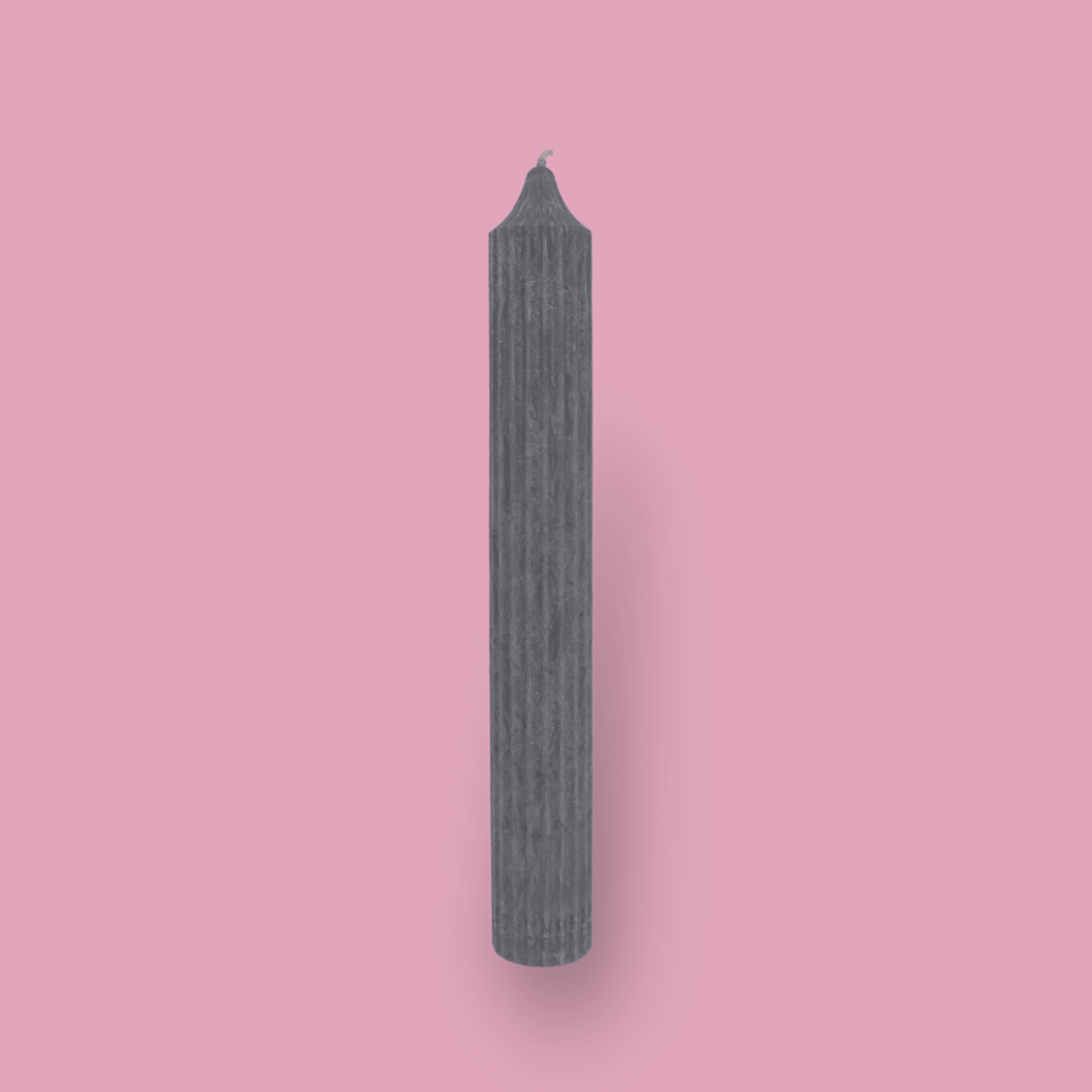 Tall pillar candle with a pointed top Elia in Quarter Moon (medium grey) colour.