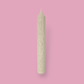 Tall pillar candle with a pointed top Elia in White Onyx (warm cream) colour.