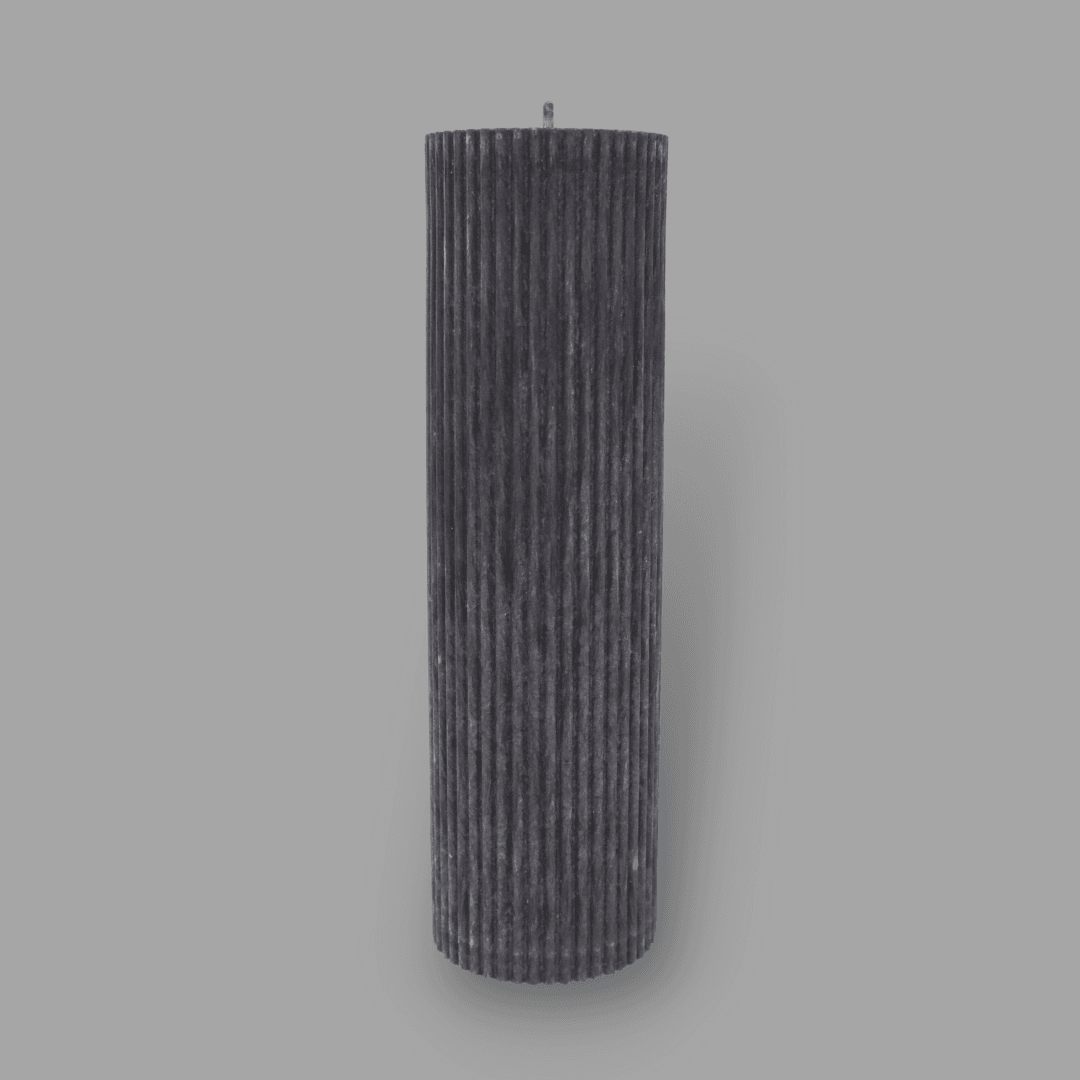 Tall thick fluted pillar candle Kaitlyn in New Moon (charcoal grey) colour. This standalone pillar candle has a flat top and base.