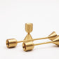 Two sided solid brass gold candlestick holders. Set of 3 holders shown.