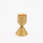 Two sided solid brass gold candlestick holder.