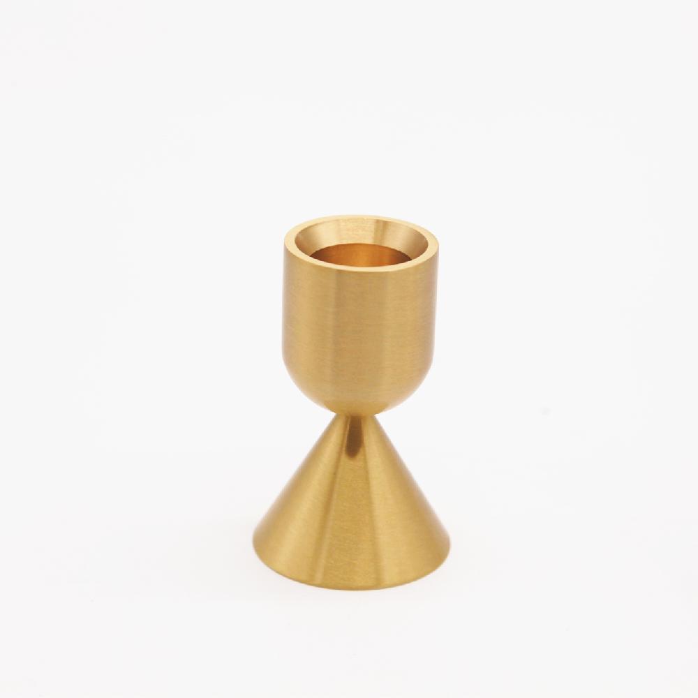 Two sided solid brass gold candlestick holder.