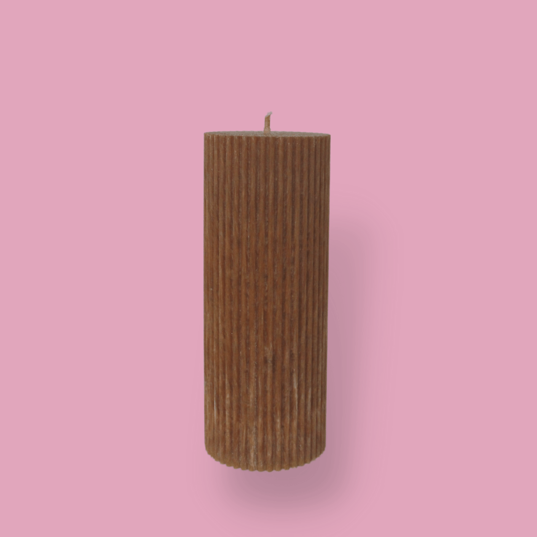 Medium height thick fluted pillar candle Marlie in Caramel colour. This standalone pillar candle has a flat top and base.