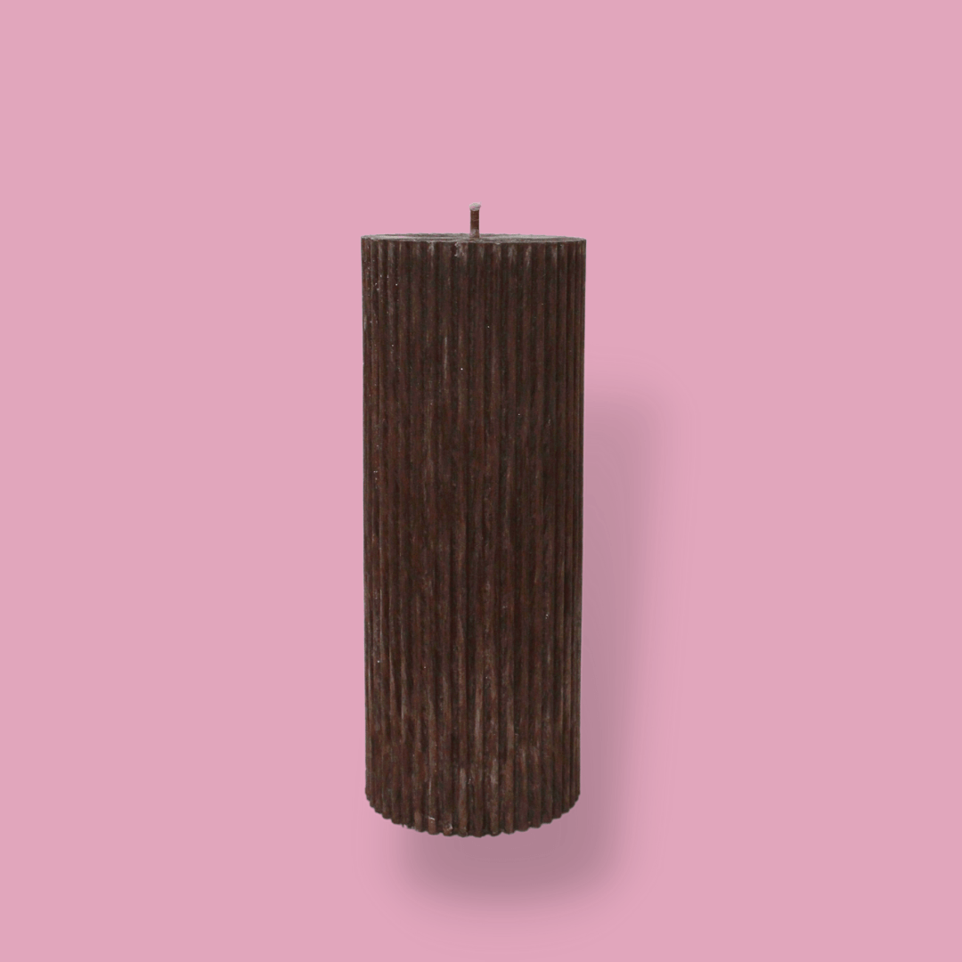 Medium height thick fluted pillar candle Marlie in Cacao (chocolate brown) colour. This standalone pillar candle has a flat top and base.