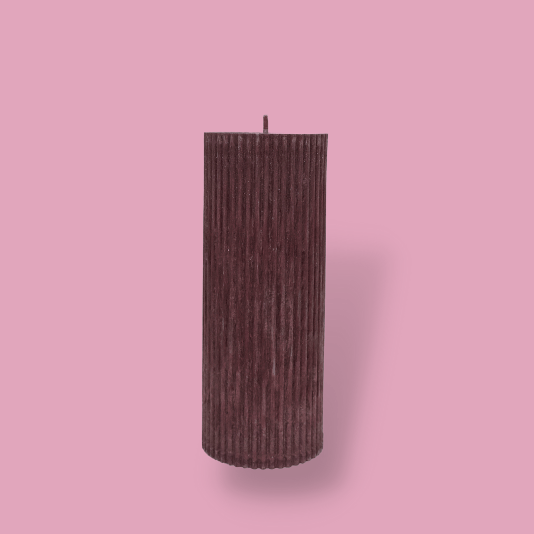 Medium height thick fluted pillar candle Marlie in Viola (wine) colour. This standalone pillar candle has a flat top and base.