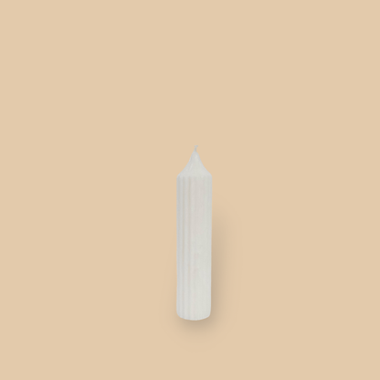 Pillar candle with a pointed top Mia in Ivory (white) colour.