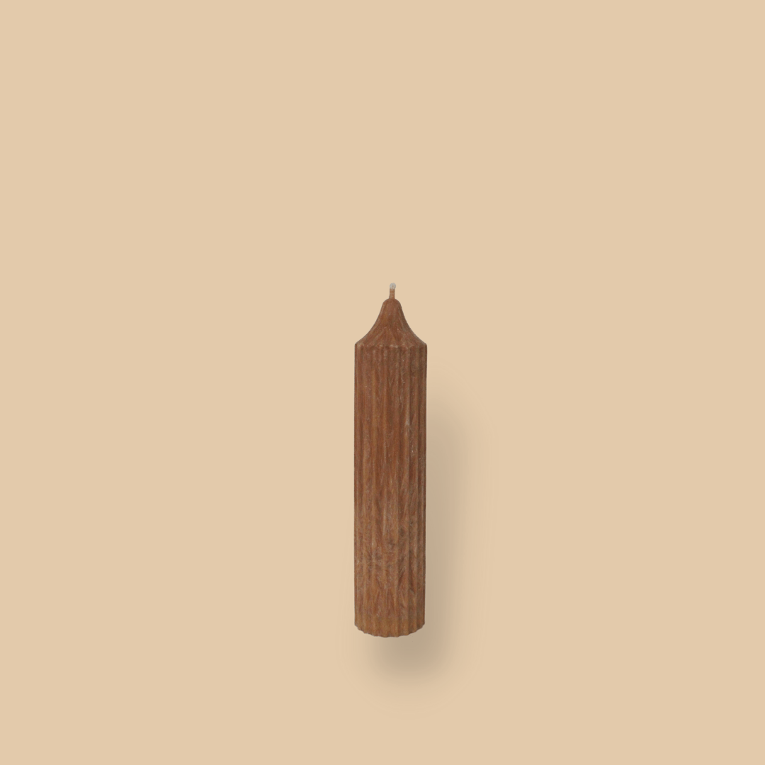 Pillar candle with a pointed top Mia in Caramel colour.