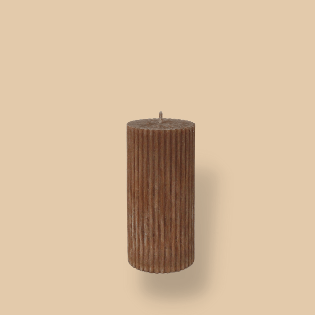 Short thick fluted pillar candle Sasha in Caramel colour. This standalone pillar candle has a flat top and base.