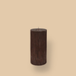 Short thick fluted pillar candle Sasha in Cacao (chocolate brown) colour. This standalone pillar candle has a flat top and base.