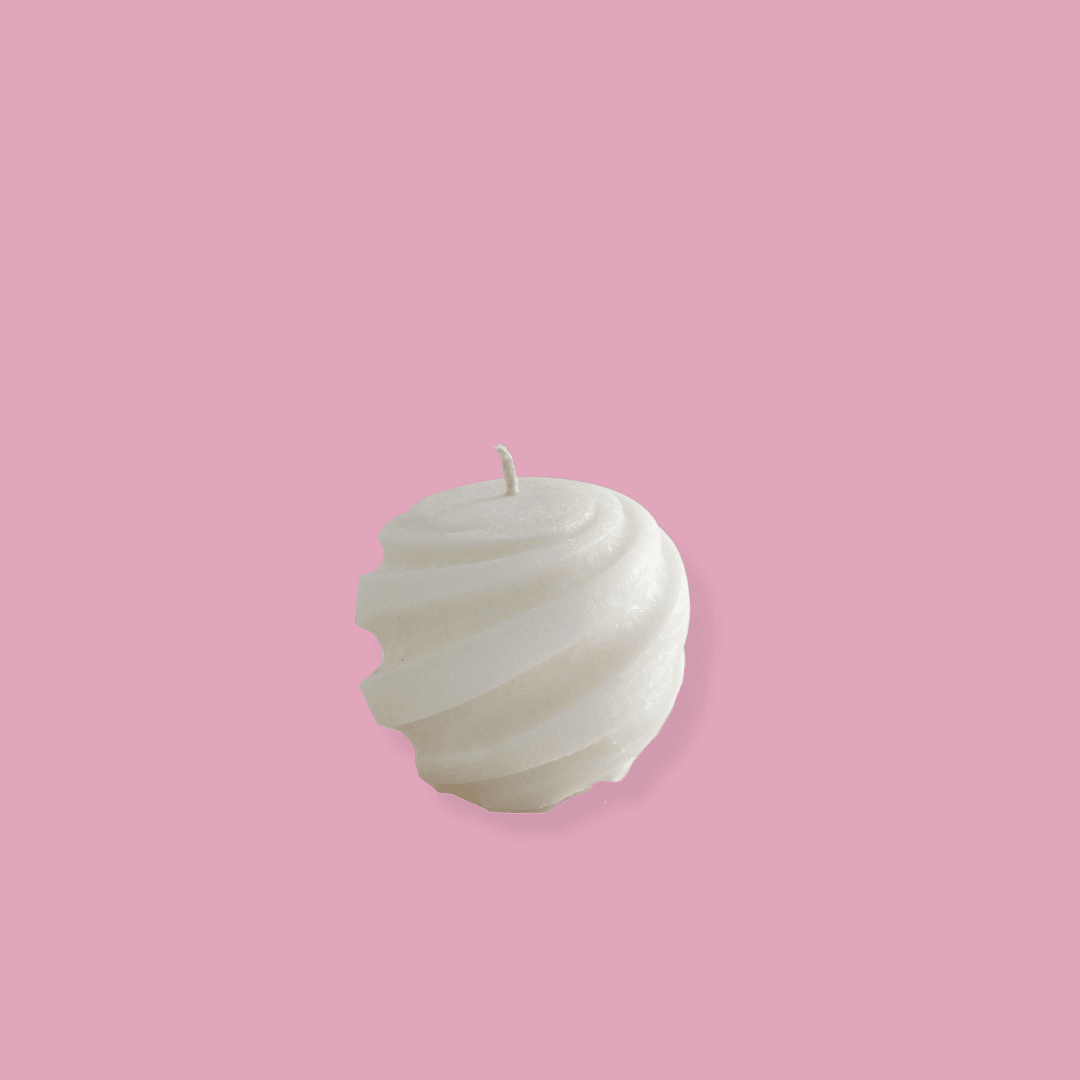 Spiral round floating candle spira shown in mini size in Ivory (white) colour.